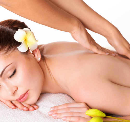 Therapist performing deep tissue massage